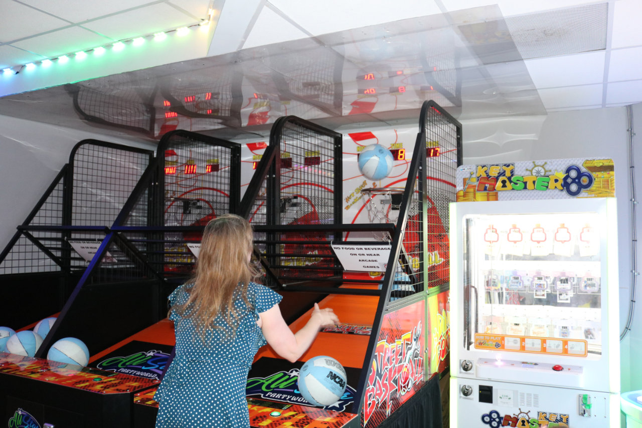 Close-up of a player at the basketball arcade at All Star Party World
