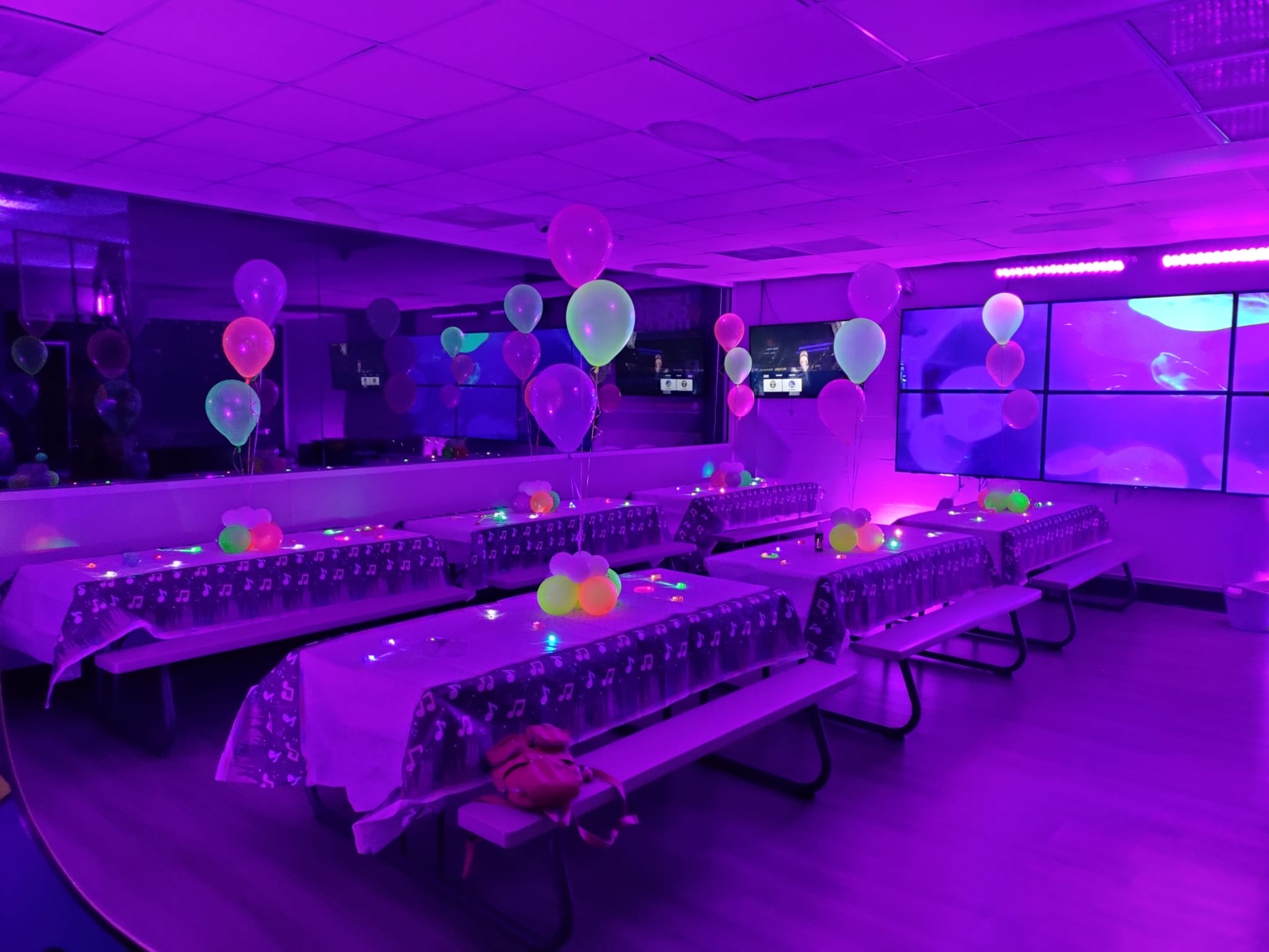 Glow party balloon table centerpieces at All Star Party World