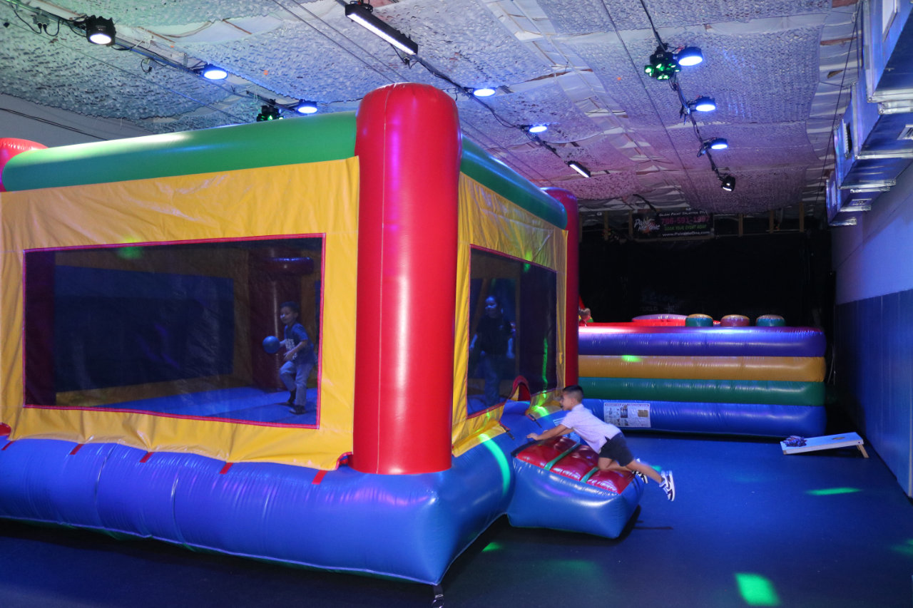 Wide view of the inflatable bounce house at All Star Party World