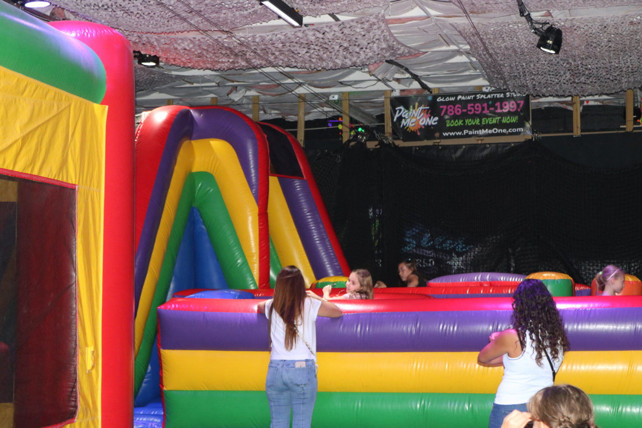 Kids near the inflatable obstacle at All Star Party World