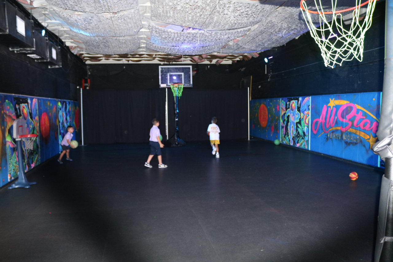 Kids on the basketball court at All Star Party World