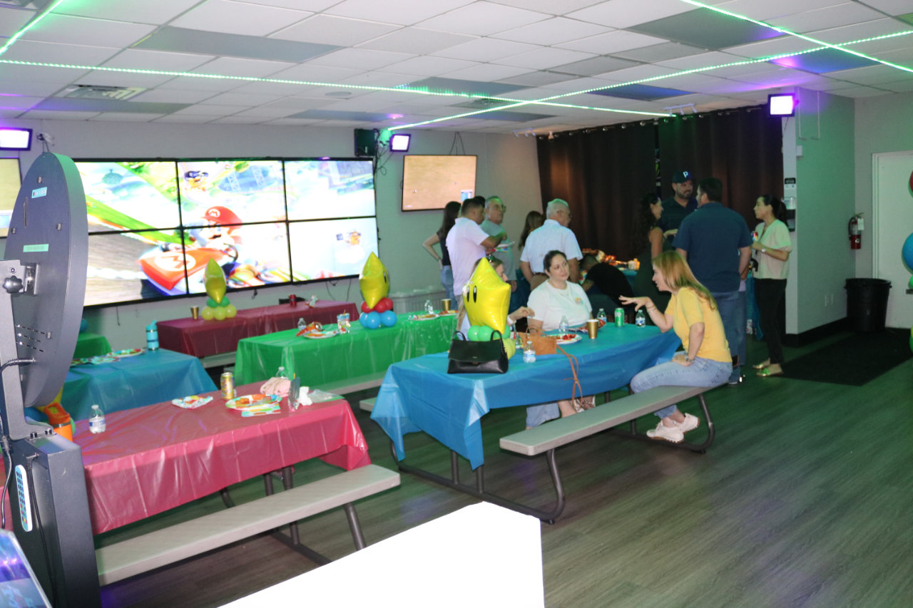 Party tables filled with guests at All Star Party World