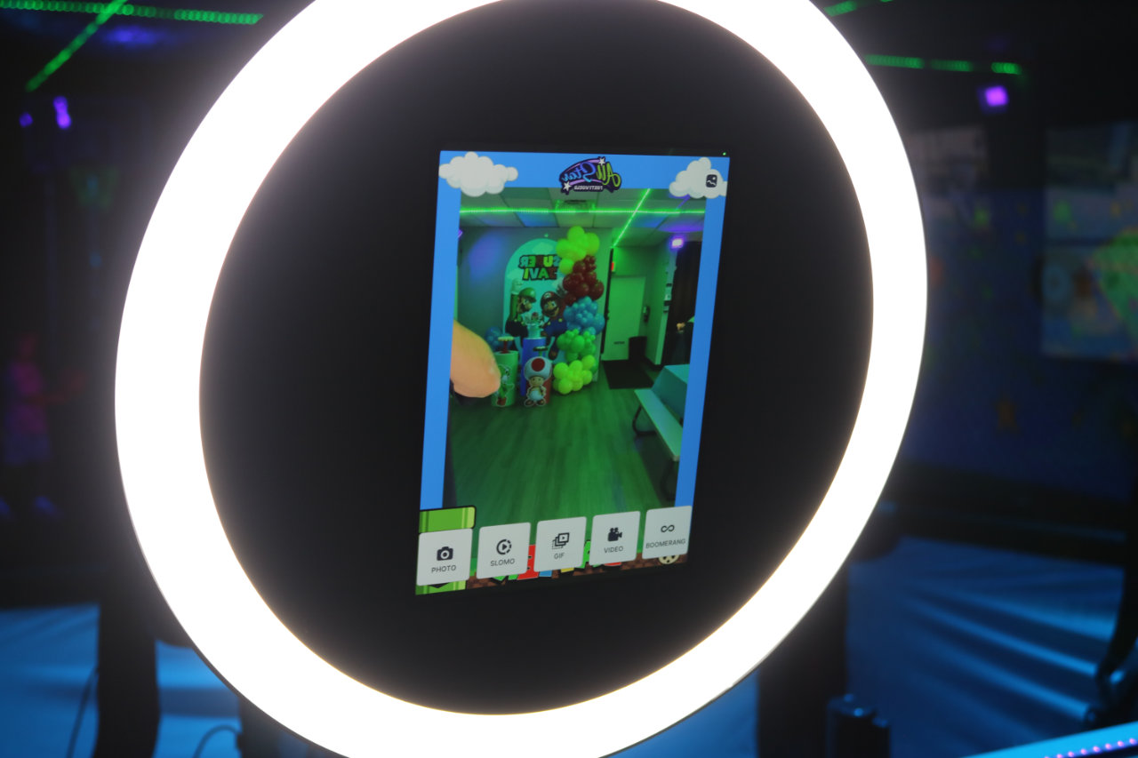 Ring light selfie station with phone at All Star Party World