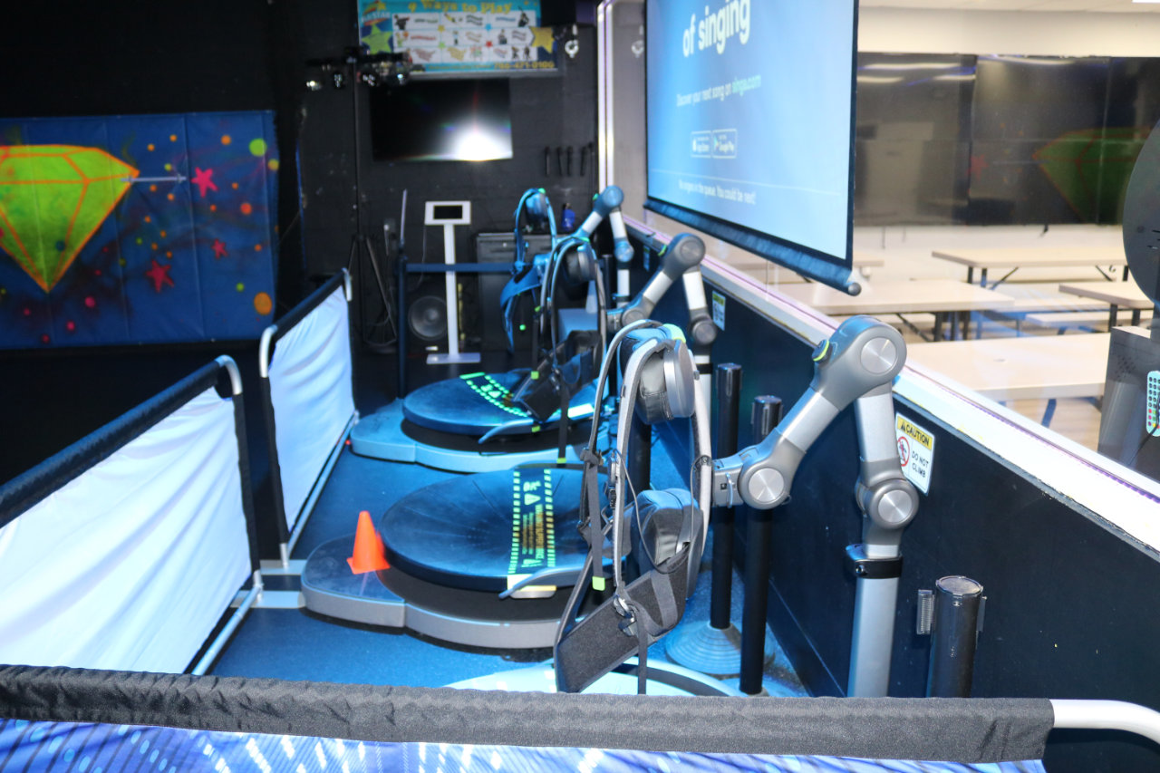 VR racing cockpit rig at All Star Party World