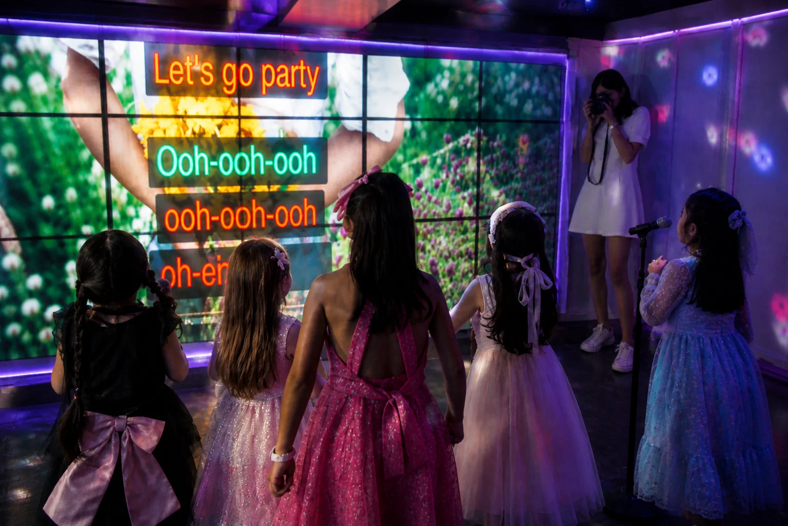 Karaoke lounge at The 305 Club with wall of TV screens